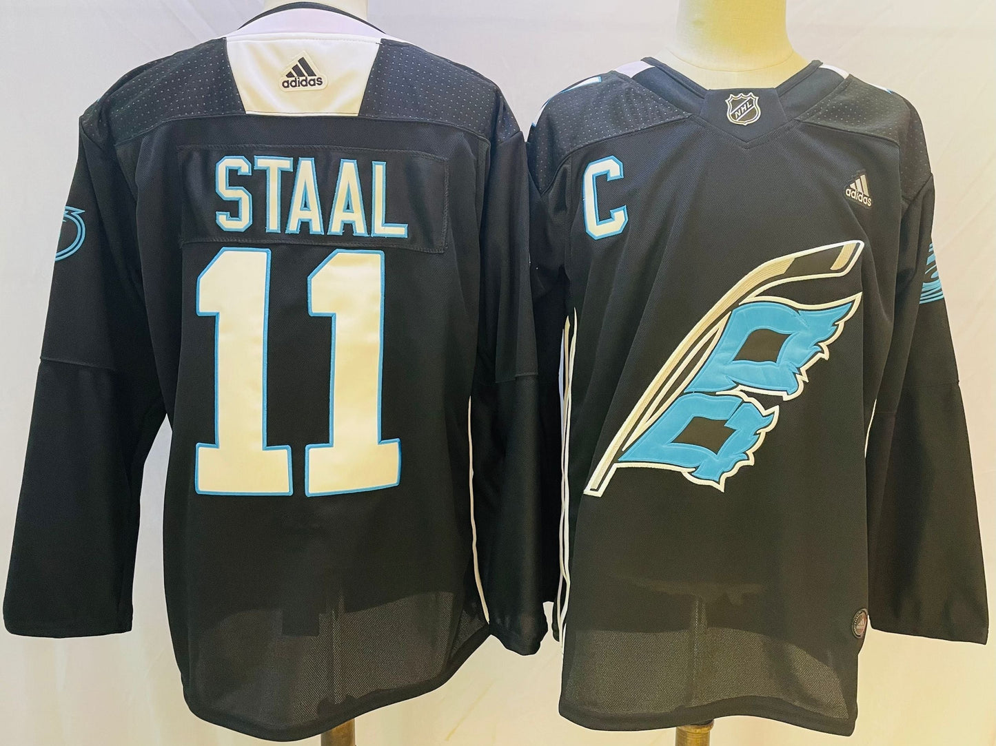 Men's Carolina Hurricanes Jordan Staal #11 Black Home Breakaway Player jersey